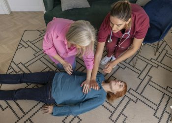 Practical CPR Demonstration with a Nurse and Two Volunteers