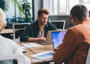 skilled businessman browsing website