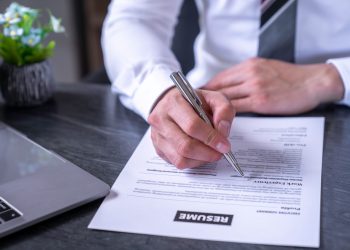 business man reading and prepare resume to submit job application online, head of HR checking resume