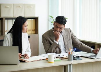 Business People Reading CV