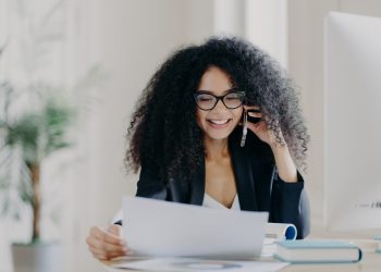 Experienced female CEO has telephone conversation, solves problem