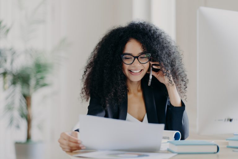 Experienced female CEO has telephone conversation, solves problem