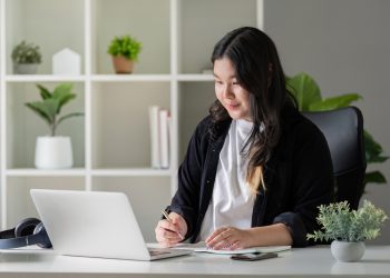 Focused Overweight Office Assistant in Video Conference for Strategic Contribution