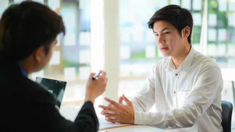 Interviewing job seekers presenting their resume for executives to consider.