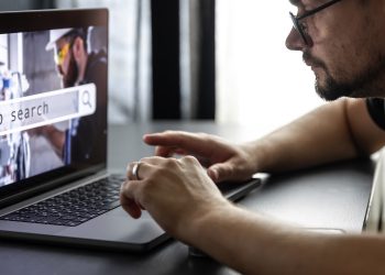 Man working on laptop and Information for the searching job, employment concept.