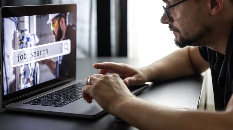 Man working on laptop and Information for the searching job, employment concept.