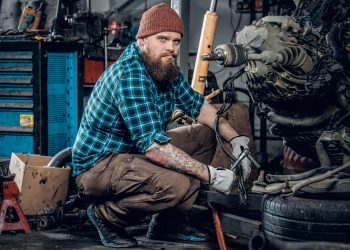 Mechanic man in a garage.
