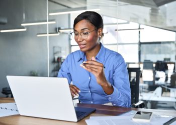 Professional African business woman hr working in office having virtual meeting.
