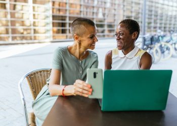 Professional Networking, Elegant Businesswomen Discussing on Terrace