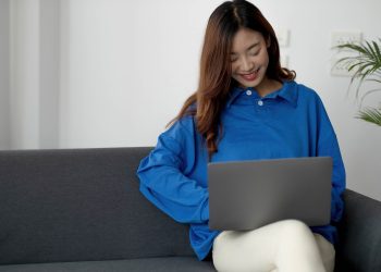 Recruitment Concept. Girl Browsing Work Opportunities Online, Using Job Search App or Website on