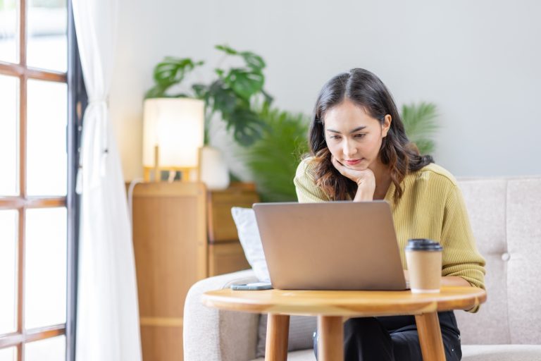 Recruitment Concept. Indian Asian Girl Browsing Work Opportunities Online, Using Job Search App or