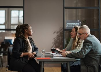 Woman talking about her qualification at job interview