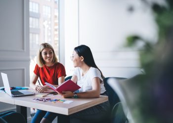Women talking with each other in studio
