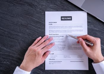 business man reading and prepare resume to submit job application online, head of HR checking resume