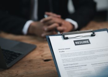 Person submitting resume to interview for a job with a company.