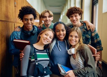 Portrait of happy high school students looking at camera.