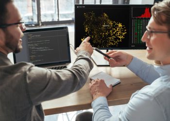 two machine learning specialists descanting about new project