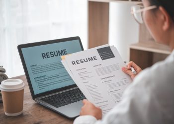 People are reviewing job applications before filling out their resume on the job